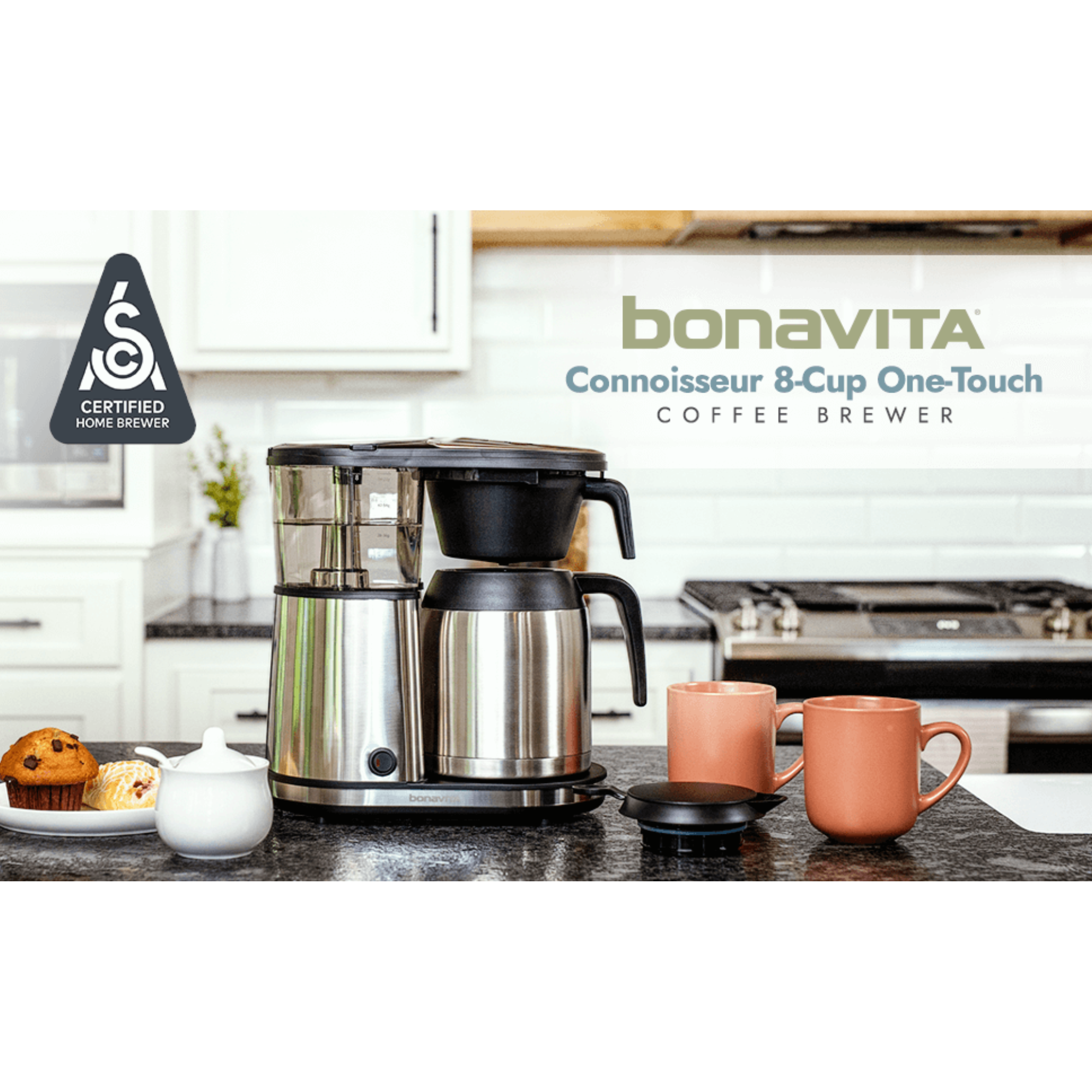 Bonavita coffee brewer on a kitchen counter with two mugs and a teapot.